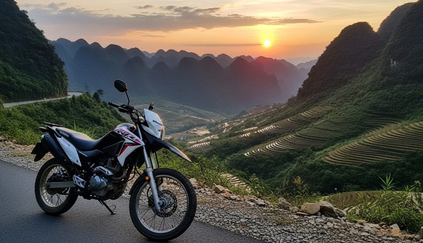 a motorcycle parked on a road with a view of the mountains